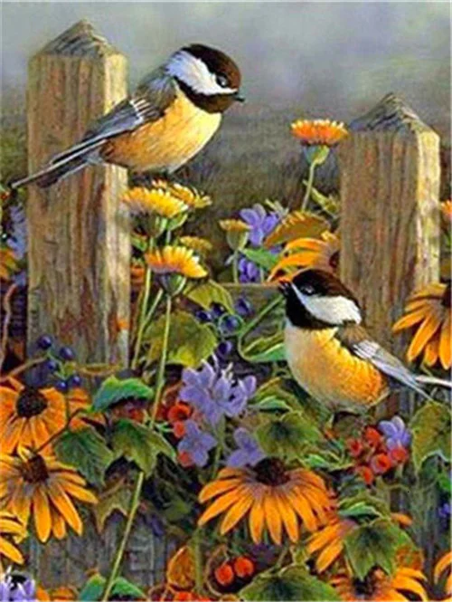 Chickadees on the Fence